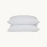 Protection and comfort with the Organic Cotton Pillow Protector Set, ensuring clean and cozy pillows.