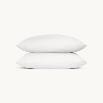 White Housewife pillowcase set, showcasing elegant design and luxurious softness.