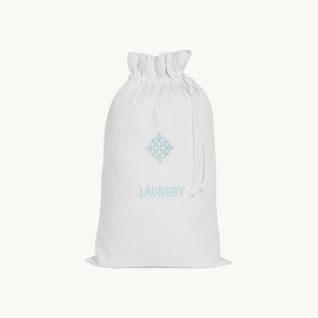 Stylish waffle laundry bag, perfect for towel storage and organization.