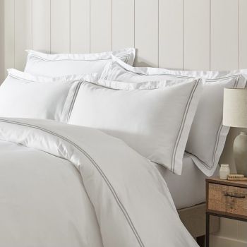 Image highlighting the Fairtrade certification emblem, representing ethically sourced bedding