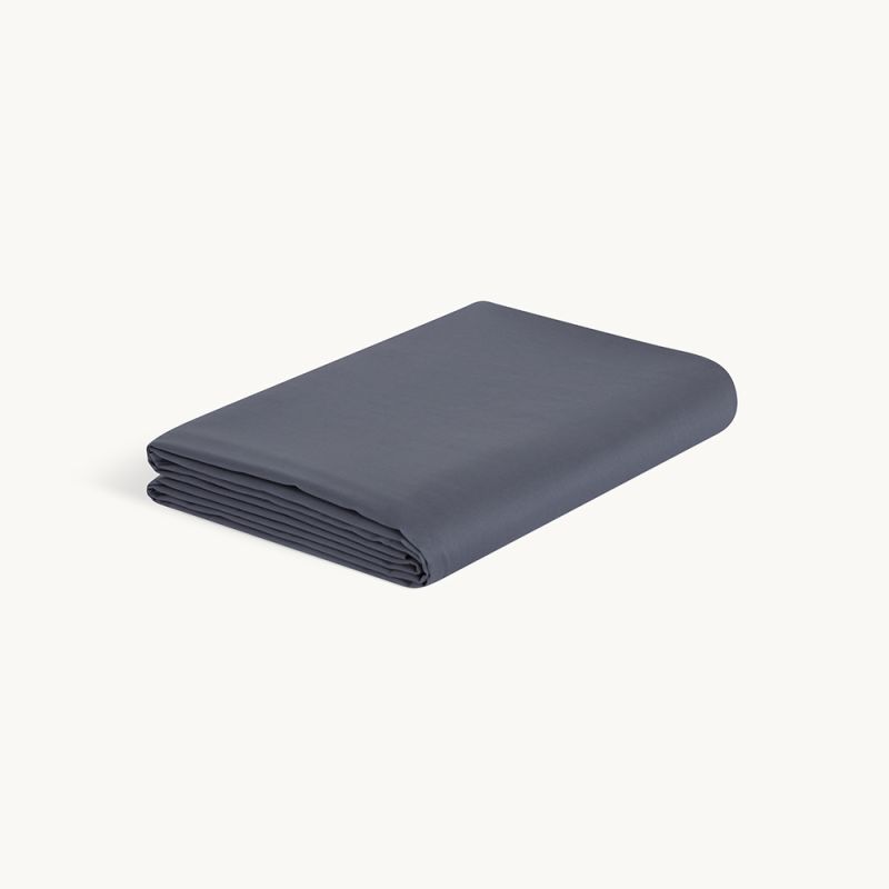 Fitted sheets made from organic cotton, promoting a serene and natural sleep environment.