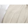 Detailed shot of a textured cotton bedspread adding sophistication to your bedroom